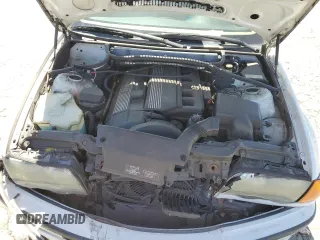 1999 BMW 3 Series 323i z VIN WBAAM3335XCA80274, wystawiony jako Copart lot #57443415 z przebiegiem 150 509 mil mil oraz Szkoda całkowita • Salvage title. Historia ofert i sprzedaży dostępna na DreamBid. Obrazek 11.
