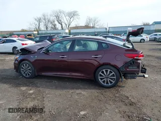 2019 Kia Optima EX with VIN 5XXGU4L11KG313557, listed as a IAAI auction lot 40973008 with 66,269 mi miles. Bid and sale history available at carsss.com. Image 14.