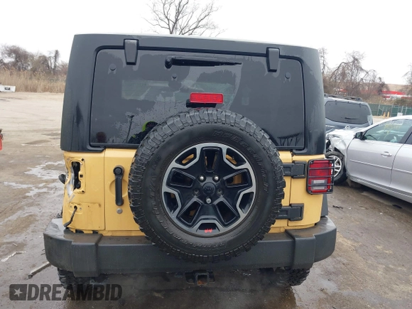 2013 Jeep Wrangler Rubicon 10th Anniversary with VIN 1C4BJWCG5DL688504, listed as a IAAI auction lot 41797184 with 109,414 mi miles and . Bid and sale history available at DreamBid. Image 16.
