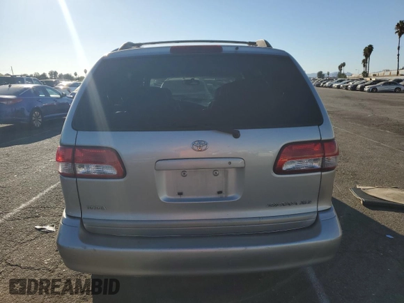 2002 Toyota Sienna LE with VIN 4T3ZF13C52U505287, listed as a Copart auction lot 77164884 with 0 mi miles and Salvage Title. Bid and sale history available at carsss.com. Image 6.