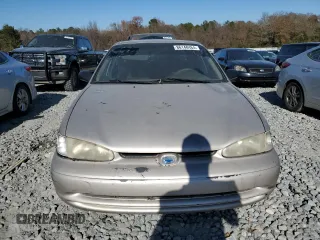 2000 Chevrolet Prizm z VIN 1Y1SK5284YZ407566, wystawiony jako Copart lot #86148464 z przebiegiem 193 844 mil mil oraz Szkoda całkowita • Salvage title. Historia ofert i sprzedaży dostępna na DreamBid. Obrazek 5.