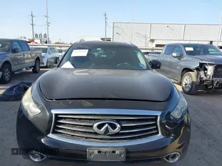 2014 Infiniti QX70 with VIN JN8CS1MU5EM450712, listed as a IAAI auction lot 41734354 with 164,349 mi miles and . Bid and sale history available at DreamBid. Image 12.