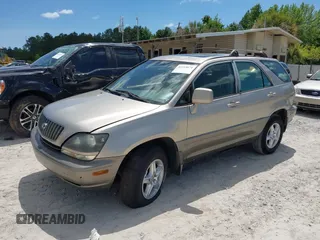 1999 Lexus RX 300 with VIN JT6GF10UXX0033370, listed as a IAAI auction lot 42115674 with 149,879 mi miles and . Bid and sale history available at DreamBid. Image 2.