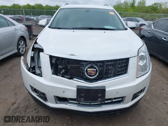 2014 Cadillac SRX Performance Collection with VIN 3GYFNCE34ES519059, listed as a IAAI auction lot 42237351 with 80,578 mi miles and . Bid and sale history available at DreamBid. Image 6.