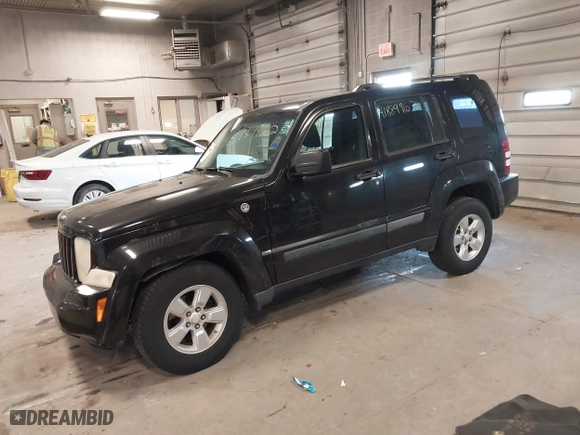 2009 Jeep Liberty Sport with VIN 1J8GN28K79W547903, listed as a IAAI auction lot 41889962 with 127,821 mi miles. Bid and sale history available at carsss.com. Image 17.