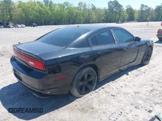 2013 Dodge Charger SE with VIN 2C3CDXBG5DH552376, listed as a IAAI auction lot 42039712 with 233,711 mi miles and . Bid and sale history available at DreamBid. Image 4.