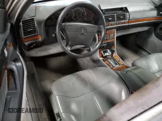 1993 Mercedes-Benz 400 z VIN WDBGA43E9PA106850, wystawiony jako Copart lot #85744534 z przebiegiem 155 005 mil mil oraz Tytuł czysty. Historia ofert i sprzedaży dostępna na DreamBid. Obrazek 8.