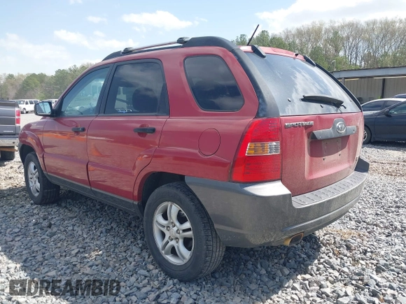 2005 Kia Sportage LX with VIN KNDJF723257132310, listed as a IAAI auction lot 41838054 with Not Provided miles and . Bid and sale history available at carsss.com. Image 3.