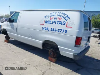 2003 Ford Econoline Cargo with VIN 1FTNE24L23HB81499, listed as a IAAI auction lot 41944485 with 86,629 mi miles and . Bid and sale history available at DreamBid. Image 3.
