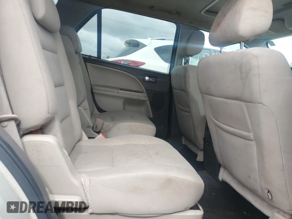 2008 Ford Taurus X SEL z VIN 1FMDK02W58GA14293, wystawiony jako Copart lot #57664585 z przebiegiem 145 529 mil mil oraz Szkoda całkowita • Salvage title. Historia ofert i sprzedaży dostępna na DreamBid. Obrazek 11.