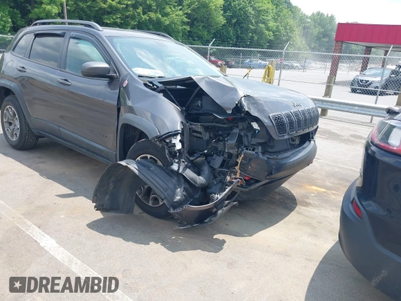2020 Jeep Cherokee Trailhawk with VIN 1C4PJMBX5LD530720, listed as a IAAI auction lot 42404948 with 99,606 mi miles and . Bid and sale history available at DreamBid. Image 1.