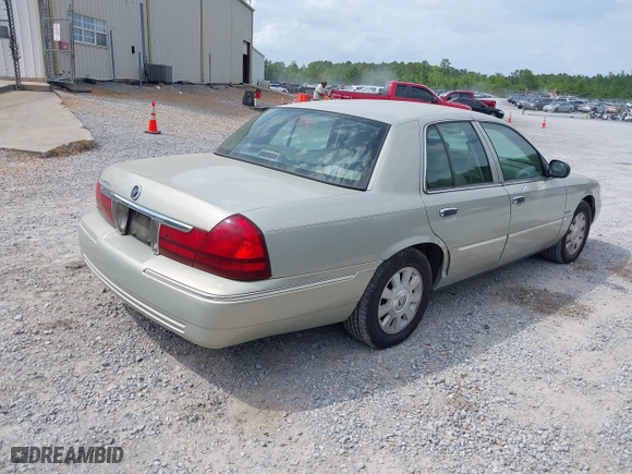 2004 Mercury Grand Marquis LS Premium with VIN 2MEFM75W14X649140, listed as a IAAI auction lot 42095663 with 88,896 mi miles. Bid and sale history available at carsss.com. Image 4.
