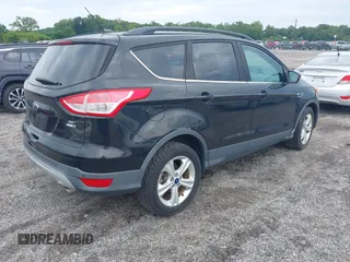 2014 Ford Escape SE with VIN 1FMCU9GX2EUB68419, listed as a IAAI auction lot 42741491 with Not provided miles and . Bid and sale history available at DreamBid. Image 4.
