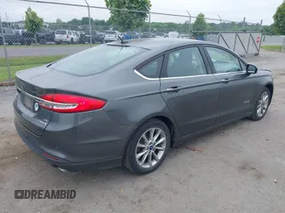2017 Ford Fusion Hybrid SE with VIN 3FA6P0LU2HR301083, listed as a IAAI auction lot 42602798 with 89,003 mi miles and . Bid and sale history available at DreamBid. Image 4.