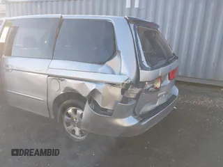 2002 Honda Odyssey EX z VIN 2HKRL18652H566576, wystawiony jako IAAI lot #40974704 z przebiegiem 232 172 mil mil oraz . Historia ofert i sprzedaży dostępna na DreamBid. Obrazek 3.