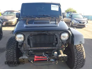 2017 Jeep Wrangler Unlimited Sahara with VIN 1C4BJWEG5HL635319, listed as a IAAI auction lot 42224748 with 141,214 mi miles and . Bid and sale history available at DreamBid. Image 13.
