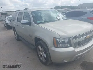 2013 Chevrolet Suburban LS with VIN 1GNSCHE01DR152210, listed as a IAAI auction lot 41528484 with 206,666 mi miles. Bid and sale history available at carsss.com. Image 1.