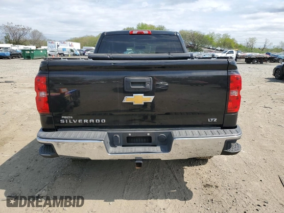 2014 Chevrolet Silverado 1500 LTZ with VIN 1GCVKSEC3EZ269921, listed as a Copart auction lot 51528565 with 137,218 mi miles and Salvage Title. Bid and sale history available at DreamBid. Image 6.