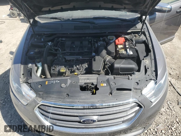 2013 Ford Taurus Limited z VIN 1FAHP2F81DG210357, wystawiony jako Copart lot #56235805 z przebiegiem 81 656 mil mil oraz Nie do naprawy • Non repairable. Historia ofert i sprzedaży dostępna na DreamBid. Obrazek 11.