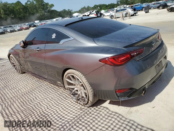 2018 Infiniti Q60 Luxe with VIN JN1EV7EKXJM340831, listed as a Copart auction lot 57178455 with 99,445 mi miles and Salvage title. Bid and sale history available at DreamBid. Image 2.
