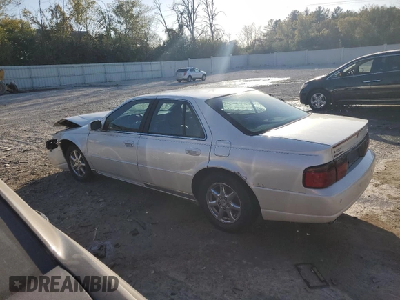 2000 Cadillac Seville Touring STS z VIN 1G6KY5497YU345038, wystawiony jako Copart lot #74315354 z przebiegiem 96 704 mil mil oraz Nie do naprawy • Non repairable. Historia ofert i sprzedaży dostępna na DreamBid. Obrazek 2.