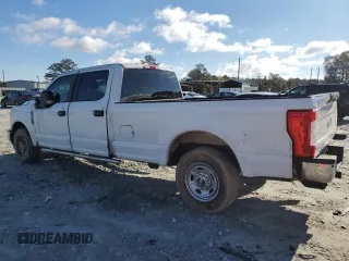 2019 Ford Super Duty F-250 SRW XL with VIN 1FT7W2A69KEF36737, listed as a Copart auction lot 84699994 with 129,810 mi miles and Salvage Title. Bid and sale history available at carsss.com. Image 2.