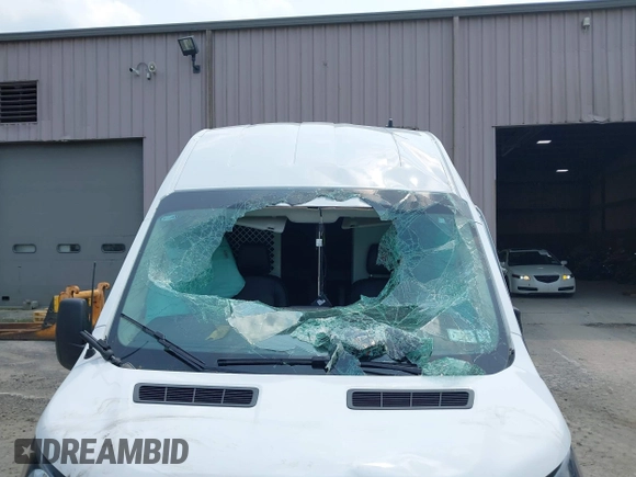 2023 Ford Transit Cargo с VIN 1FTBR1X81PKB01837, выставлен на аукционе IAAI как лот 42489358 с пробегом 68 143 миль миль и . История ставок и продаж доступна на DreamBid. Изображение 6.