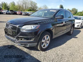 2014 Audi Q7 Premium with VIN WA1CGAFE9ED019934, listed as a Copart auction lot 56388595 with 104,549 mi miles and Salvage title. Bid and sale history available at DreamBid. Image 1.