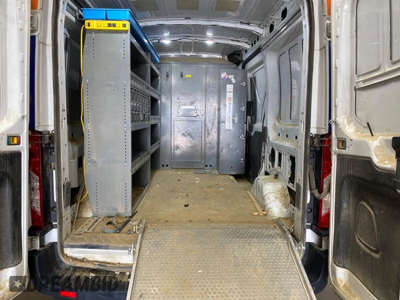 2020 Ford Transit Cargo with VIN 1FTBR1CG6LKA17312, listed as a IAAI auction lot 42284054 with 173,479 mi miles and . Bid and sale history available at DreamBid. Image 12.