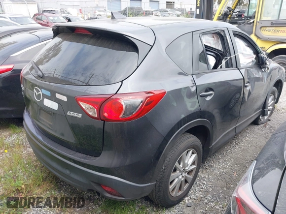 2016 Mazda CX-5 Touring with VIN JM3KE2CY6G0832967, listed as a IAAI auction lot 41943527 with 1 mi miles. Bid and sale history available at carsss.com. Image 4.
