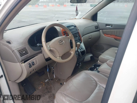 2010 Toyota Sienna XLE with VIN 5TDYK4CC1AS330349, listed as a IAAI auction lot 41607065 with 258,145 mi miles and . Bid and sale history available at carsss.com. Image 5.