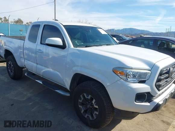 2018 Toyota Tacoma SR with VIN 5TFRX5GN9JX106232, listed as a IAAI auction lot 41634120 with 66,674 mi miles and . Bid and sale history available at DreamBid. Image 1.