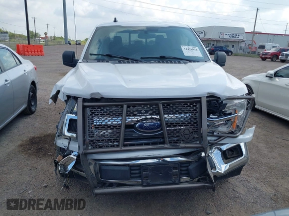 2019 Ford F-150 XL z VIN 1FTEW1E50KKE04180, wystawiony jako IAAI lot #42421022 z przebiegiem 73 912 mil mil oraz . Historia ofert i sprzedaży dostępna na DreamBid. Obrazek 13.