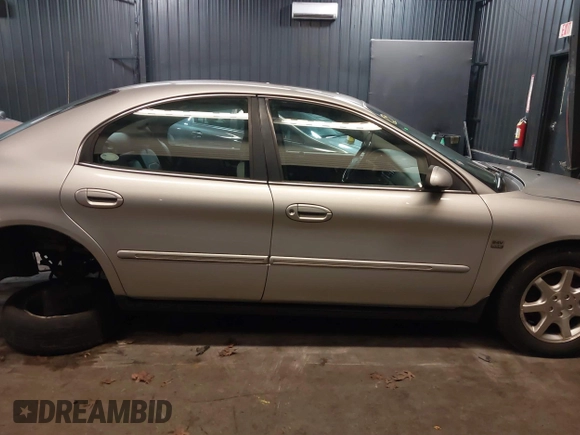 2002 Mercury Sable LS Premium with VIN 1MEFM55S32A612145, listed as a IAAI auction lot 41744306 with 84,865 mi miles and . Bid and sale history available at DreamBid. Image 13.
