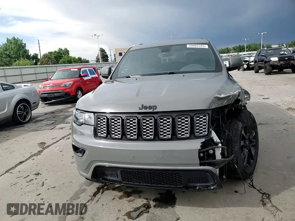 2020 Jeep Grand Cherokee Laredo E with VIN 1C4RJFAG4LC139344, listed as a Copart auction lot 59982545 with 60,529 mi miles and Salvage title. Bid and sale history available at DreamBid. Image 14.