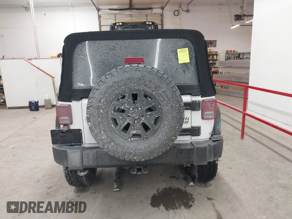 2016 Jeep Wrangler Sport with VIN 1C4AJWAG9GL261958, listed as a IAAI auction lot 41595490 with 32,433 mi miles and . Bid and sale history available at carsss.com. Image 16.