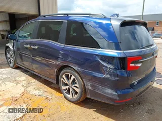 2022 Honda Odyssey Touring with VIN 5FNRL6H86NB004865, listed as a IAAI auction lot 42254009 with 47,229 mi miles and . Bid and sale history available at DreamBid. Image 3.