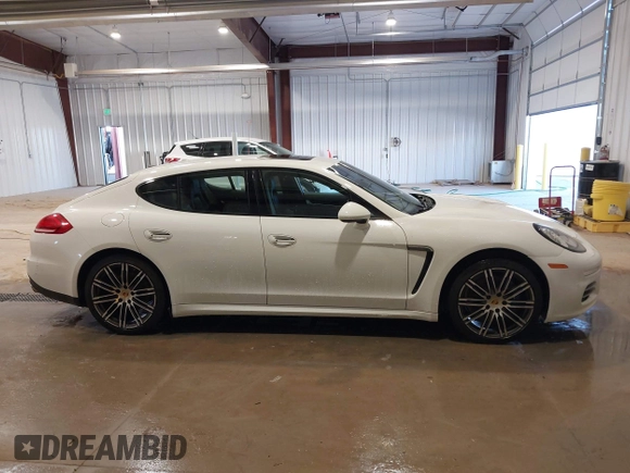 2016 Porsche Panamera 4 z VIN WP0AA2A71GL000087, wystawiony jako IAAI lot #41435476 z przebiegiem 103 537 mil mil oraz . Historia ofert i sprzedaży dostępna na DreamBid. Obrazek 13.