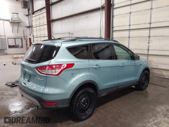 2013 Ford Escape SE with VIN 1FMCU0GX9DUB40739, listed as a IAAI auction lot 41633757 with 87,522 mi miles and . Bid and sale history available at DreamBid. Image 4.