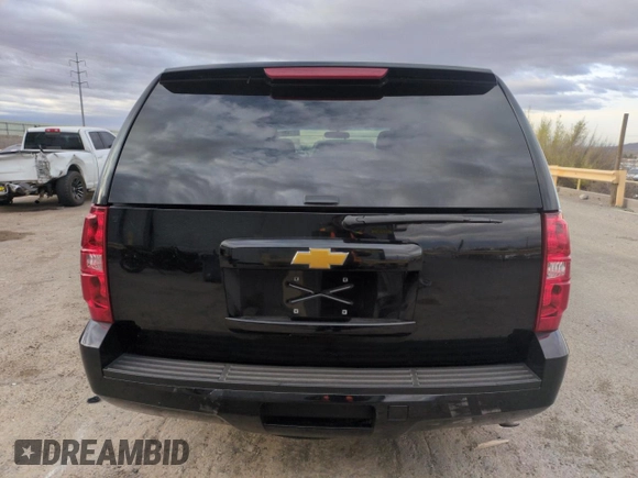 2014 Chevrolet Tahoe Commercial z VIN 1GNLC2E06ER207611, wystawiony jako Copart lot #51472355 z przebiegiem 125 893 mil mil oraz Szkoda całkowita • Salvage title. Historia ofert i sprzedaży dostępna na DreamBid. Obrazek 6.
