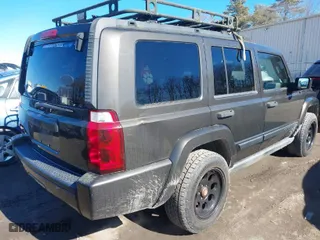 2006 Jeep Commander with VIN 1J8HG48KX6C195357, listed as a IAAI auction lot 41525843 with 158,235 mi miles. Bid and sale history available at carsss.com. Image 4.
