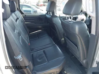 2012 Honda Ridgeline RTL with VIN 5FPYK1F56CB457687, listed as a IAAI auction lot 42582331 with 96,357 mi miles and . Bid and sale history available at DreamBid. Image 8.