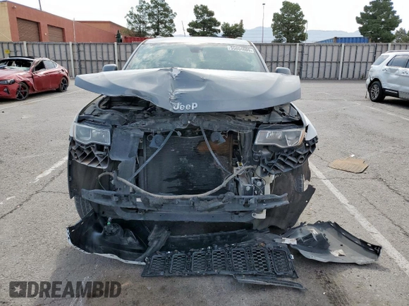 2017 Jeep Grand Cherokee Laredo with VIN 1C4RJEAG6HC614543, listed as a Copart auction lot 55804605 with 89,730 mi miles and Salvage title. Bid and sale history available at DreamBid. Image 5.