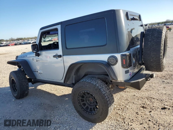 2009 Jeep Wrangler Rubicon with VIN 1J8GA64159L700909, listed as a Copart auction lot 86308954 with 138,065 mi miles and Salvage title. Bid and sale history available at DreamBid. Image 2.
