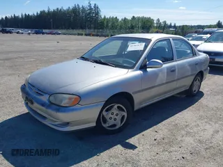 2001 Kia Sephia z VIN KNAFB121515092630, wystawiony jako IAAI lot #42361635 z przebiegiem 183 434 mil mil oraz . Historia ofert i sprzedaży dostępna na DreamBid. Obrazek 2.
