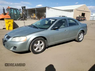 2005 Dodge Stratus SXT z VIN 1B3EL46T55N676140, wystawiony jako Copart lot #50550895 z przebiegiem 144 207 mil mil oraz Szkody całkowita. Historia ofert i sprzedaży dostępna na DreamBid. Obrazek 1.