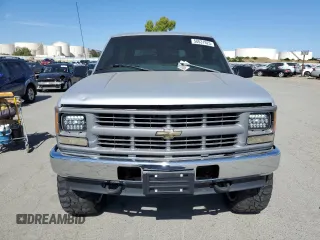 1997 Chevrolet Tahoe z VIN 3GNEK18R1VG112163, wystawiony jako Copart lot #58631925 z przebiegiem 213 262 mil mil oraz Tytuł czysty. Historia ofert i sprzedaży dostępna na DreamBid. Obrazek 5.