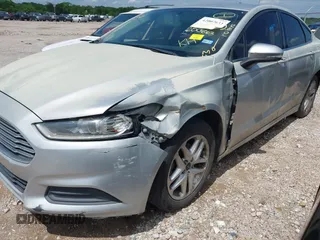 2016 Ford Fusion SE with VIN 1FA6P0H78G5131820, listed as a IAAI auction lot 42007633 with 200,863 mi miles. Bid and sale history available at carsss.com. Image 6.