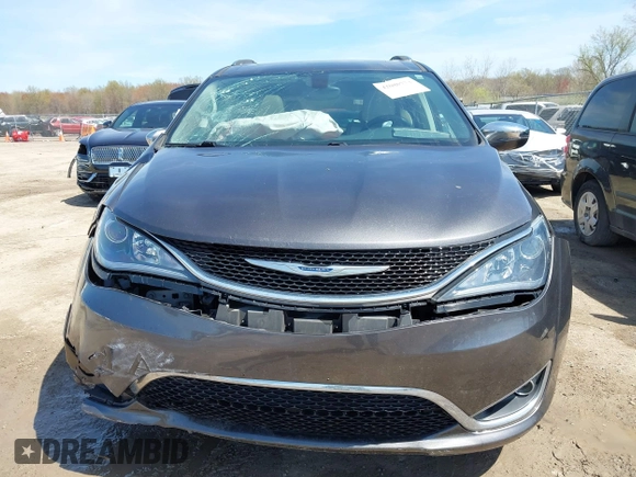 2017 Chrysler Pacifica Limited with VIN 2C4RC1GGXHR744875, listed as a IAAI auction lot 42080773 with 86,896 mi miles and . Bid and sale history available at DreamBid. Image 11.