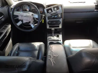 2009 Dodge Charger SXT with VIN 2B3KA33V99H628678, listed as a Copart auction lot 52313595 with 231,562 mi miles and Clean Title. Bid and sale history available at carsss.com. Image 8.